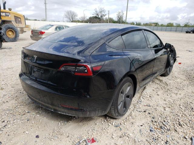 Photo 4 from auction – 2021 TESLA MODEL 3 with VIN 5YJ3E1EA3MF853974