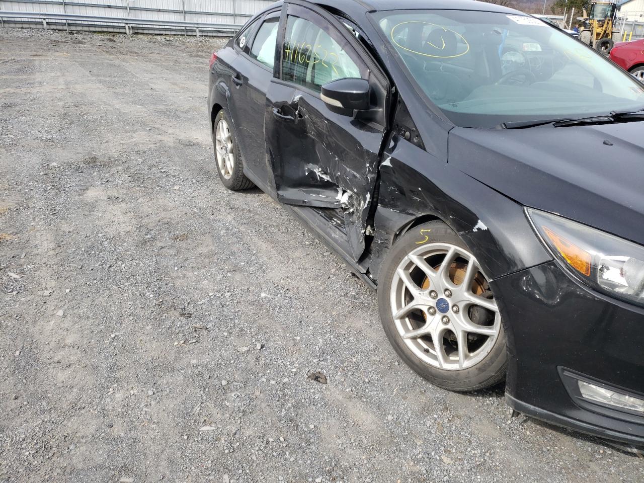 Photo 9 from auction – 2015 FORD FOCUS SE with VIN 1FADP3F21FL291287