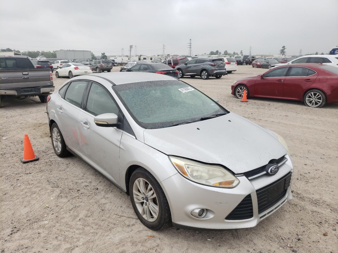 FORD FOCUS SEL 2012 with VIN 1FAHP3H24CL357633 - Photo from auction