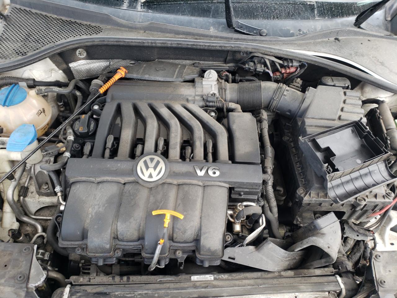 Photo 7 from auction – 2012 VOLKSWAGEN PASSAT SE with VIN 1VWBM7A37CC075597