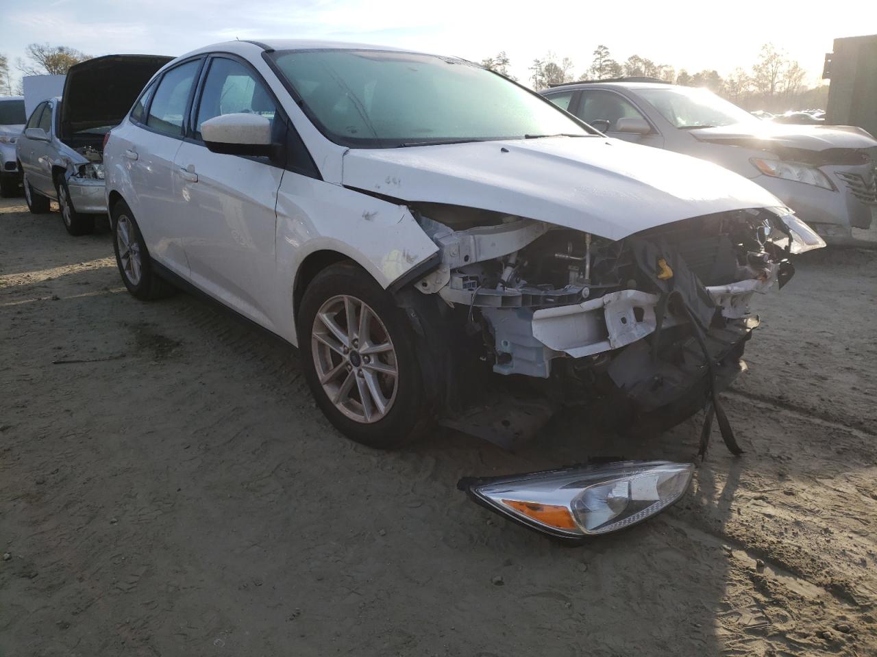 FORD FOCUS SE 2018 with VIN 1FADP3FE9JL226688 - Photo from auction