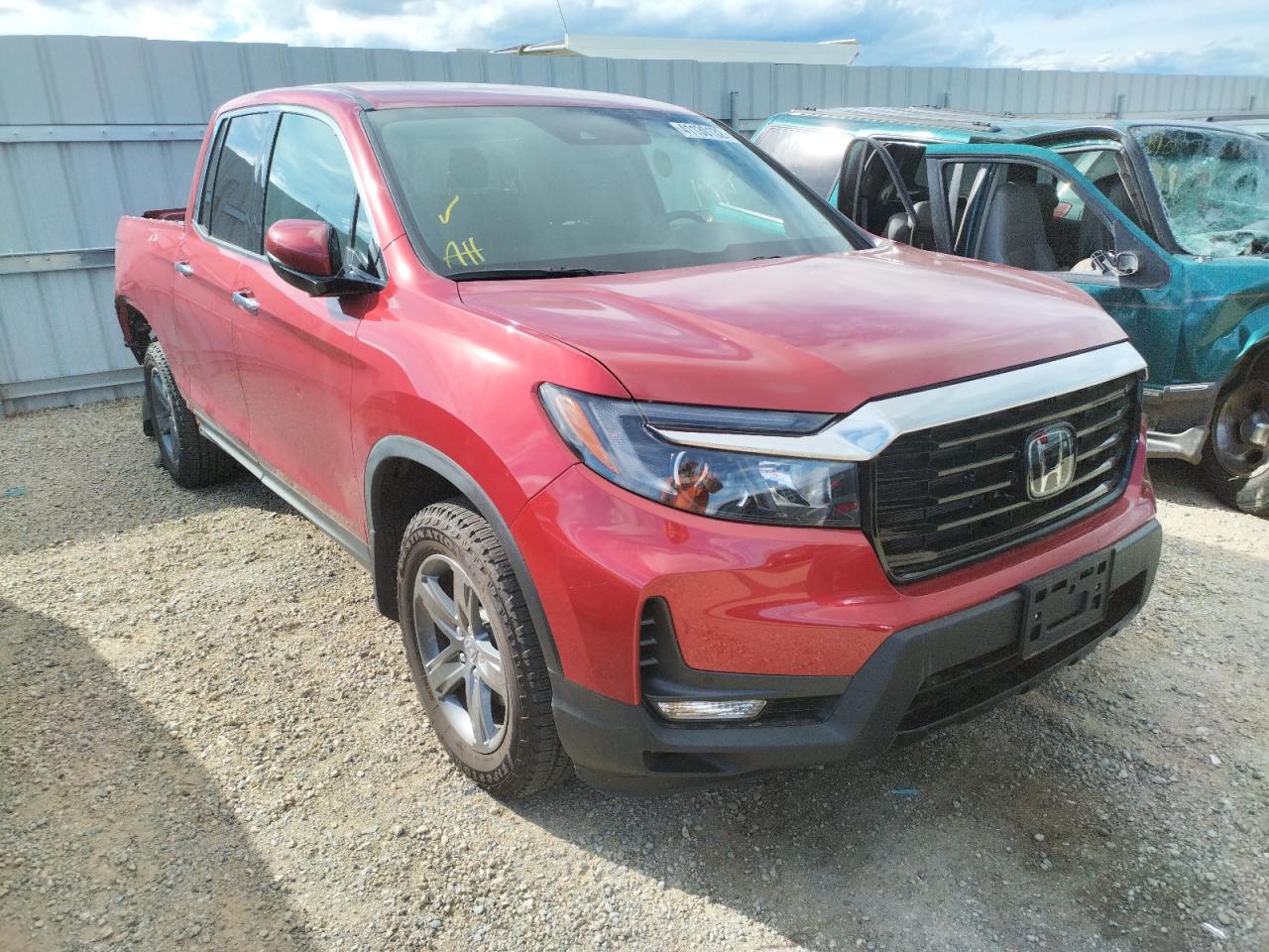 HONDA RIDGELINE 2021 with VIN 5FPYK3F74MB018048 - Photo from auction