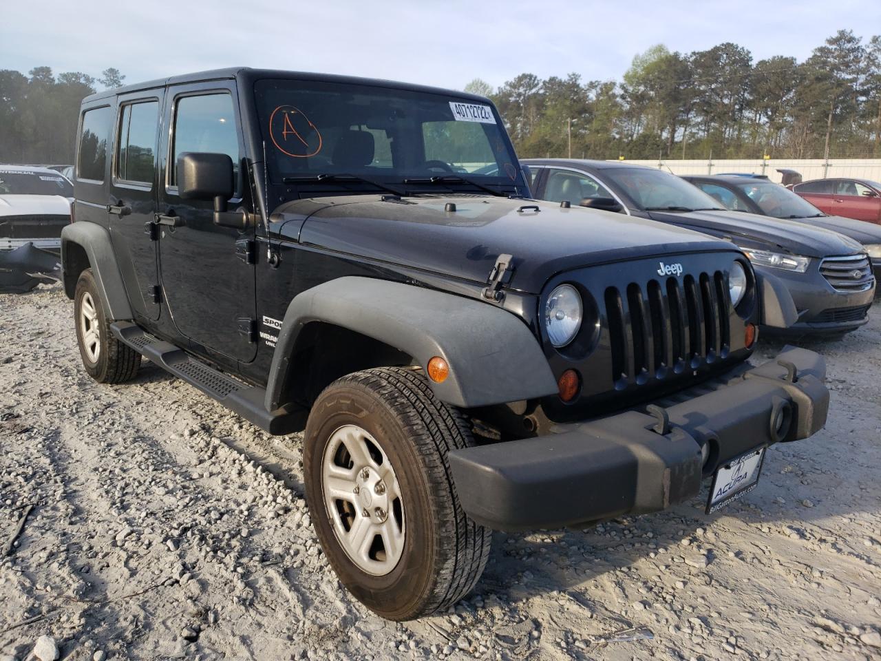 JEEP WRANGLER U 2011 with VIN 1J4BA3H17BL536864 - Photo from auction