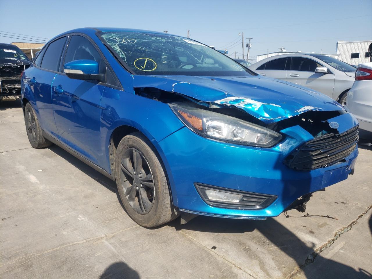 FORD FOCUS SE 2016 with VIN 1FADP3FE7GL257835 - Photo from auction