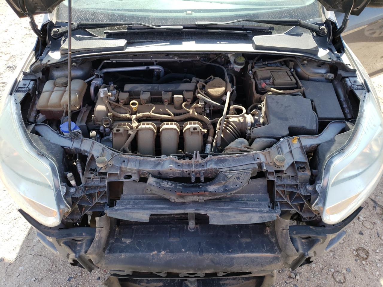 Photo 7 from auction – 2014 FORD FOCUS S with VIN 1FADP3E24EL419764