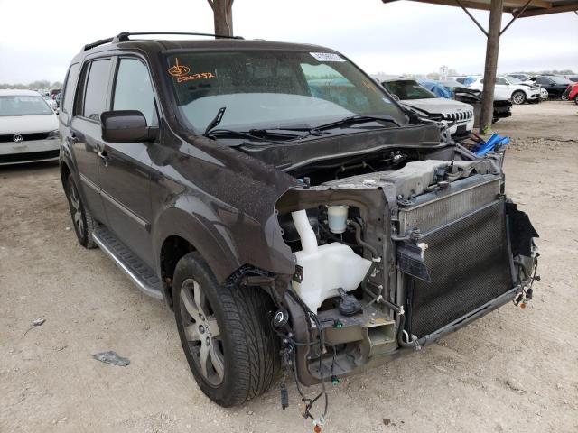 HONDA PILOT TOUR 2014 مع رقم تعريف المركبة 5FNYF3H91EB026752 - صورة من المزاد