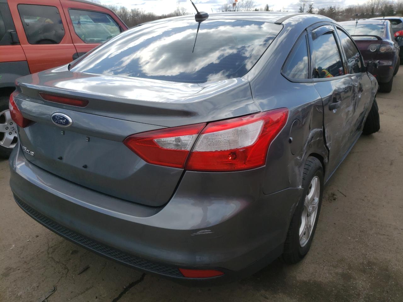 Photo 4 from auction – 2014 FORD FOCUS S with VIN 1FADP3E26EL358935