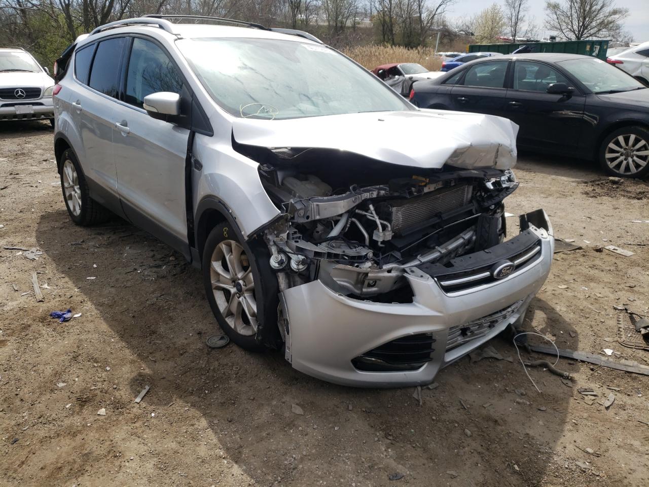 FORD ESCAPE TIT 2016 with VIN 1FMCU9JXXGUB85531 - Photo from auction