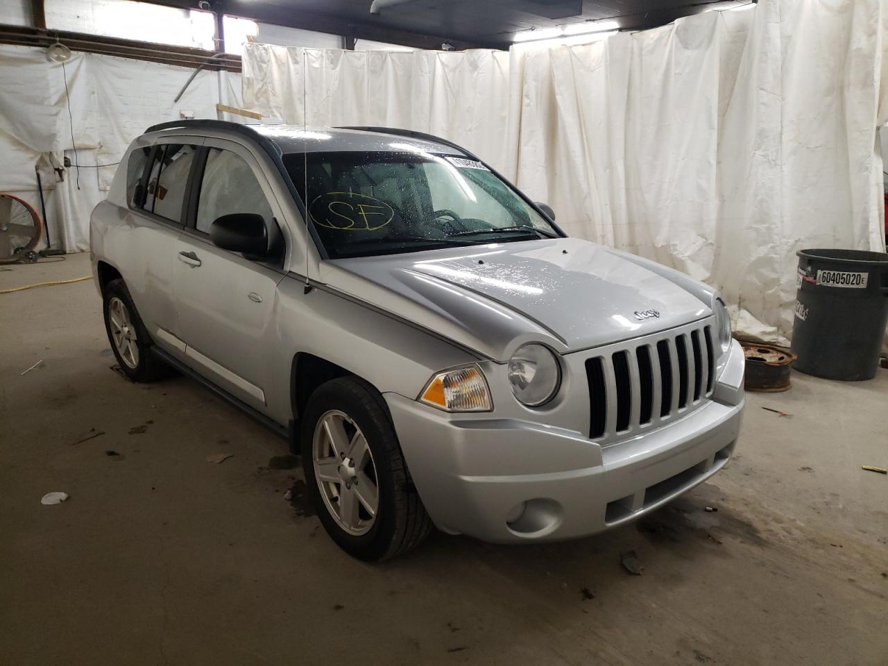 JEEP COMPASS SP 2010 with VIN 1J4NF1FB7AD620416 - Photo from auction