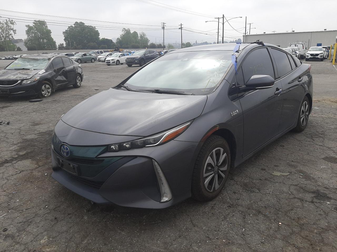Photo 2 from auction – 2017 TOYOTA PRIUS PRIM with VIN JTDKARFP5H3067525