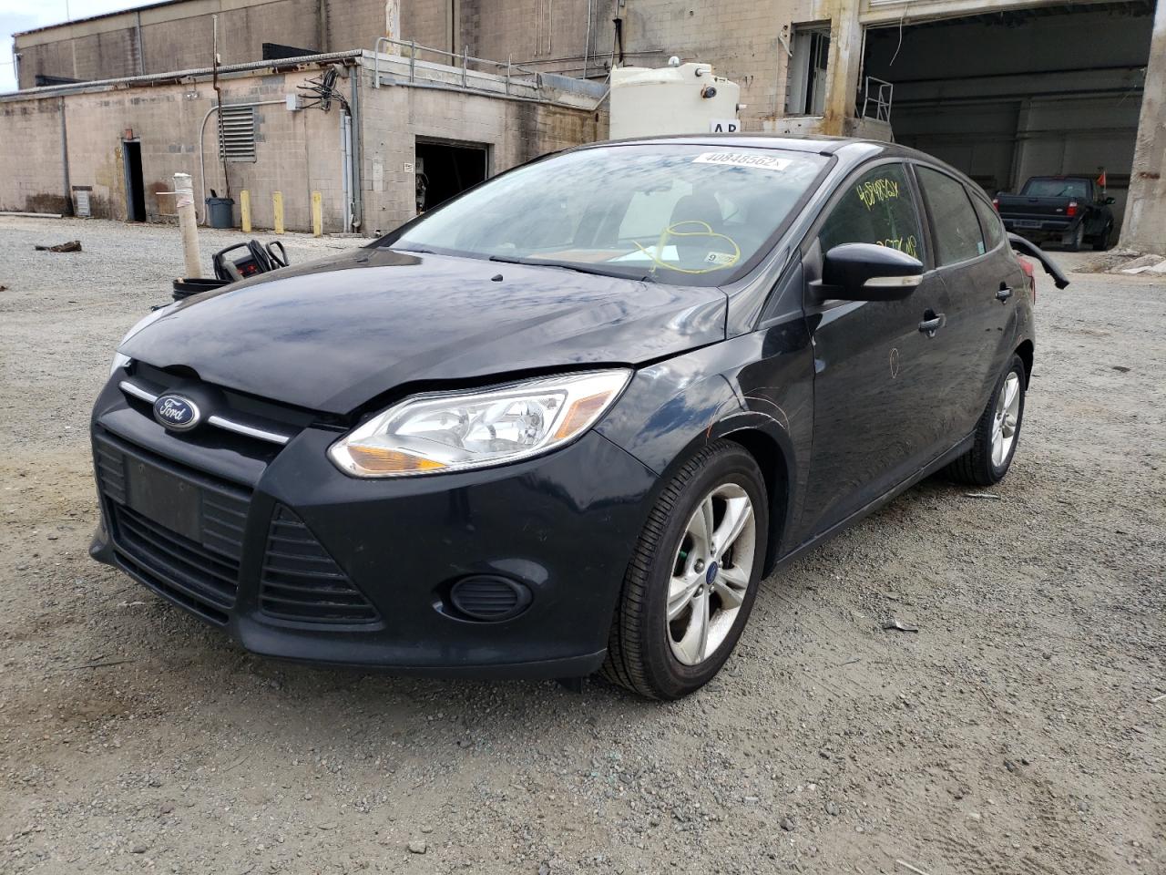 Foto 2 de la subasta – 2014 FORD FOCUS SE con VIN 1FADP3K28EL153783