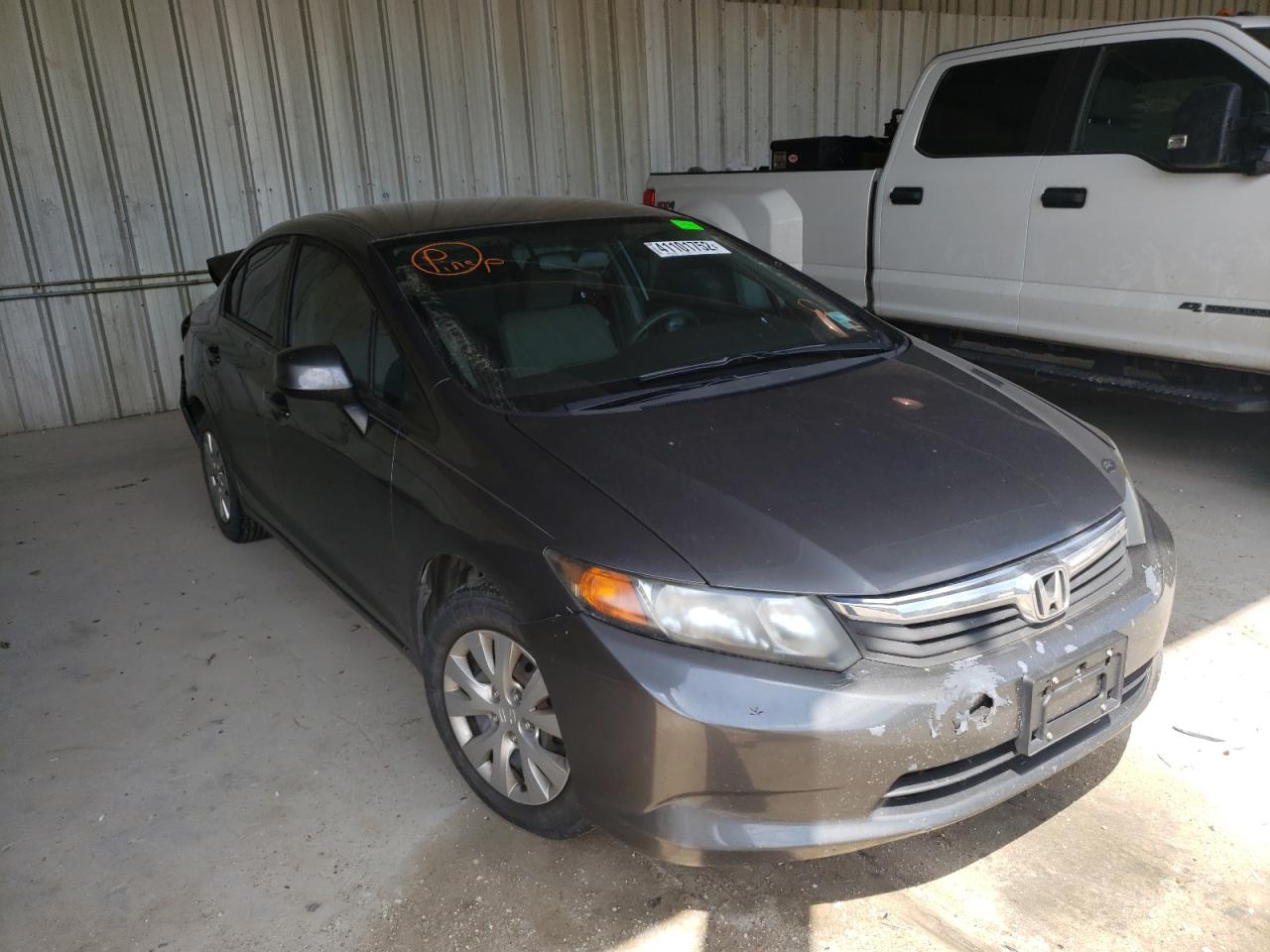 HONDA CIVIC LX 2012 with VIN 19XFB2F50CE006573 - Photo from auction