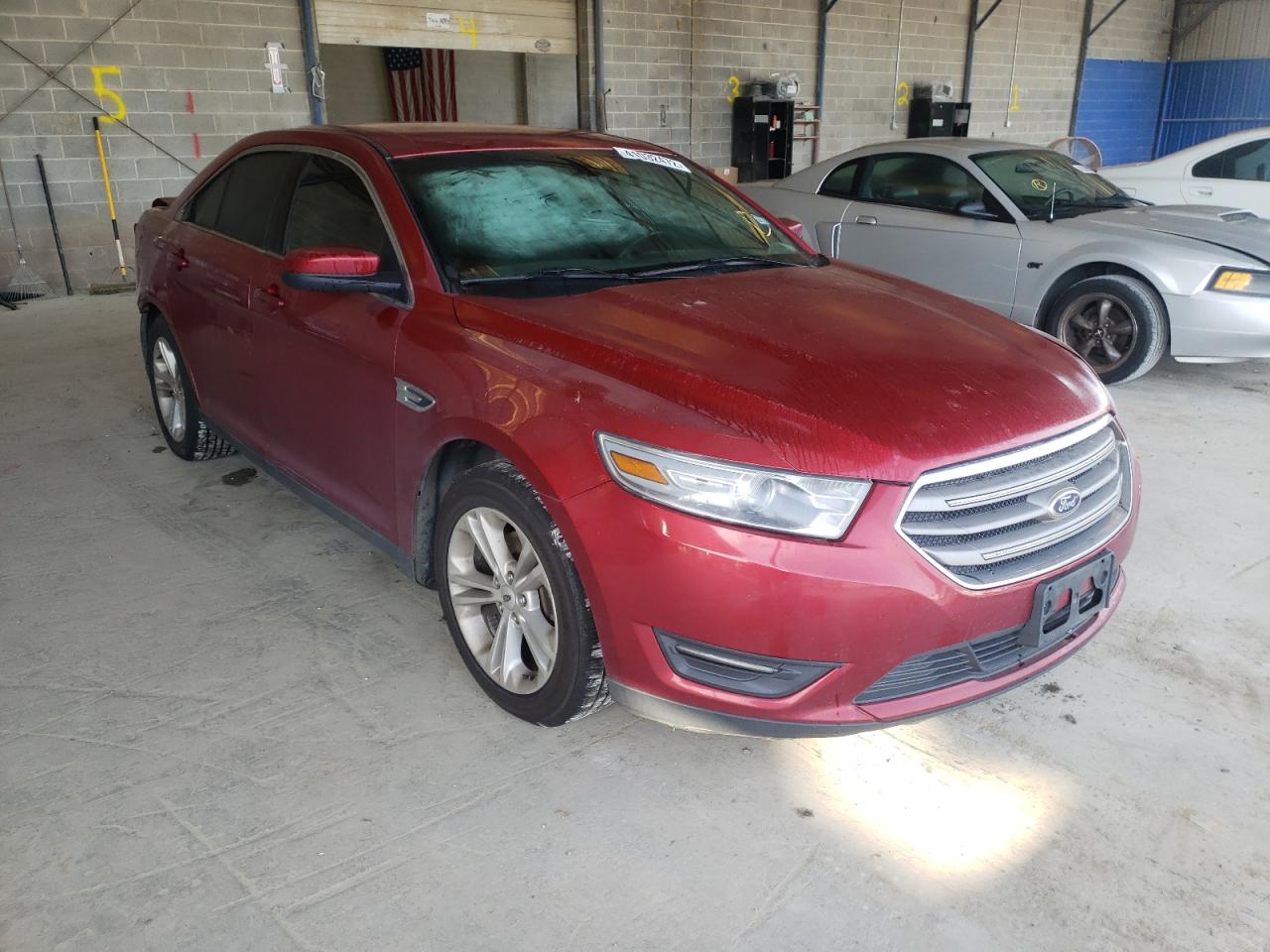 FORD TAURUS SEL 2013 with VIN 1FAHP2E81DG212000 - Photo from auction