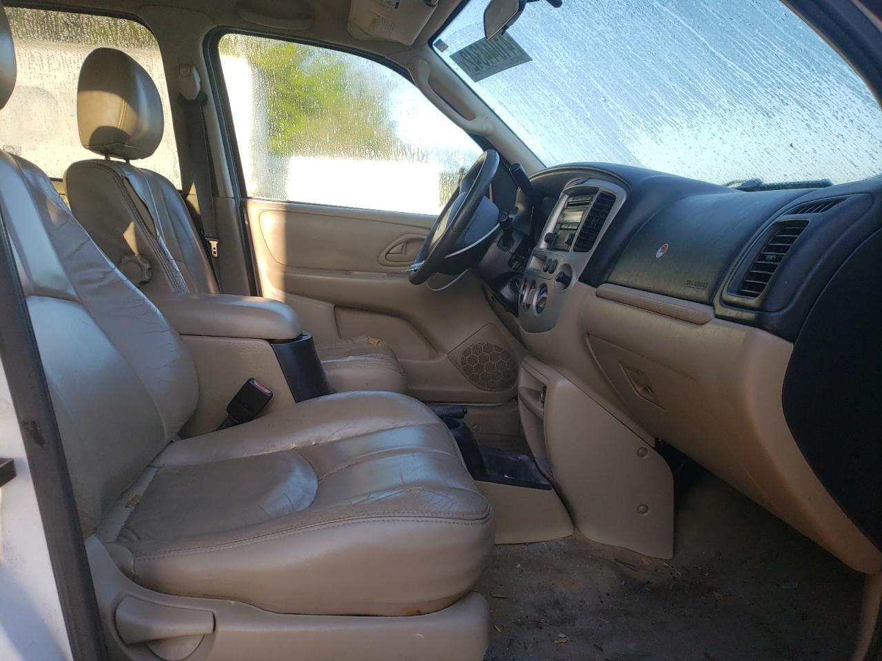 Photo 5 from auction – 2004 MAZDA TRIBUTE LX with VIN 4F2YZ04124KM00745
