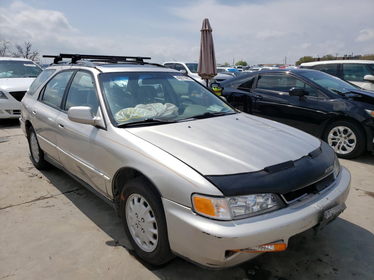 HONDA ACCORD EX 1997 with VIN 1HGCE1890VA004933 - Photo from auction