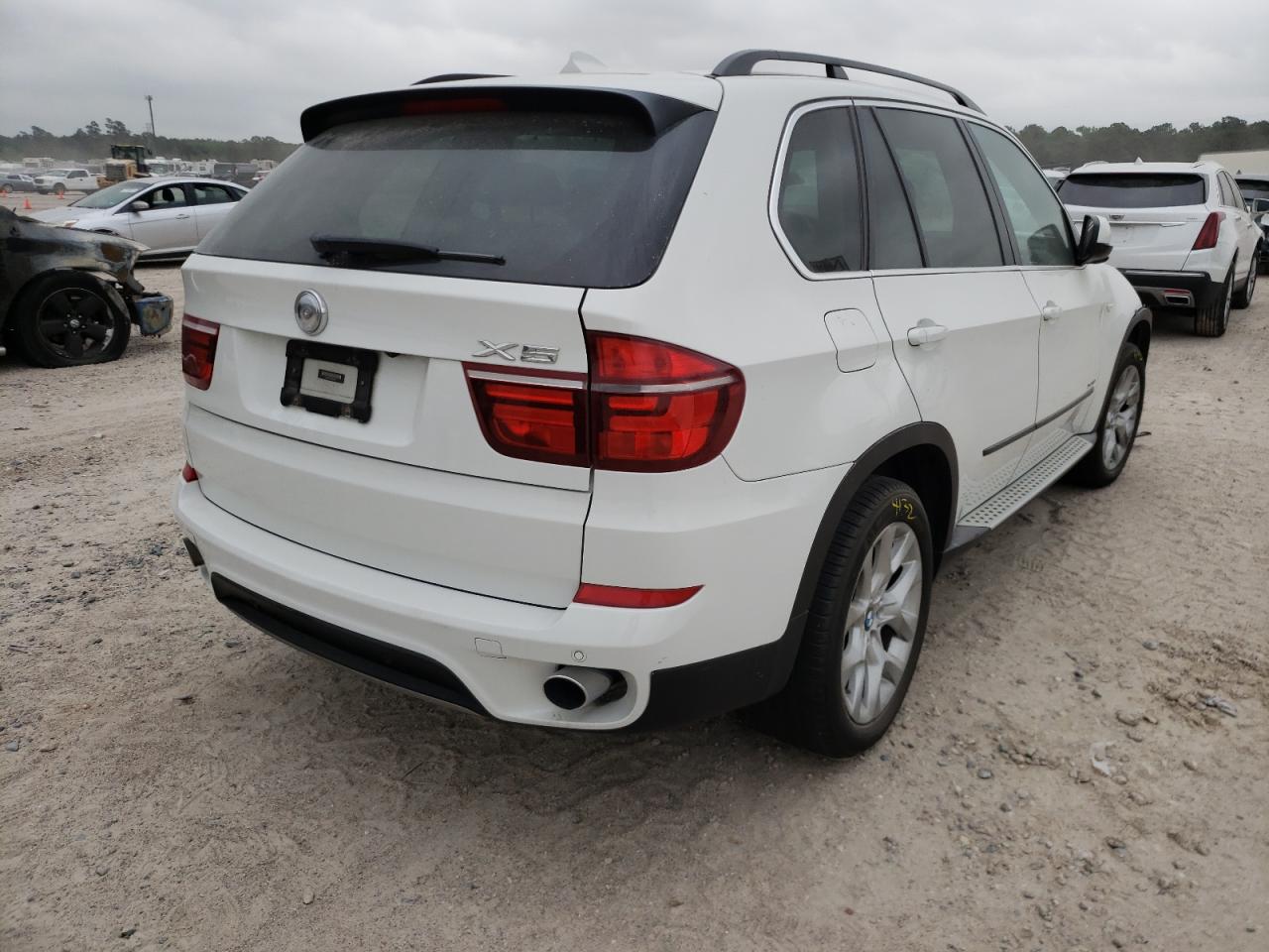 Photo 4 from auction – 2013 BMW X5 XDRIVE3 with VIN 5UXZV4C50D0B24641