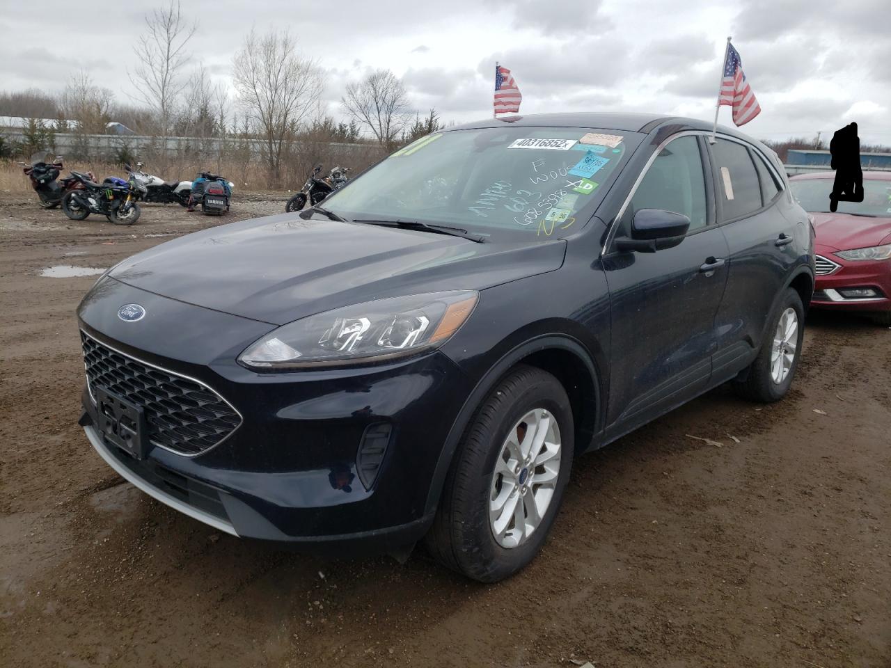 Photo 2 from auction – 2021 FORD ESCAPE SE with VIN 1FMCU9G65MUA32601