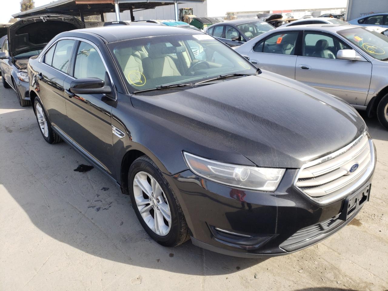 FORD TAURUS SEL 2015 with VIN 1FAHP2E82FG140761 - Photo from auction
