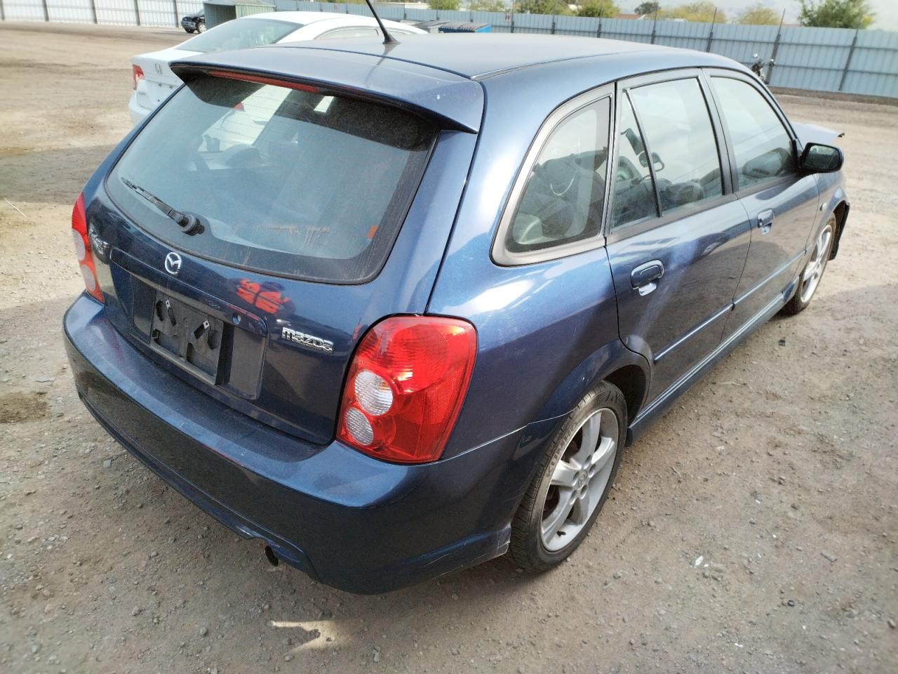 Photo 4 from auction – 2003 MAZDA PROTEGE PR with VIN JM1BJ245931153689