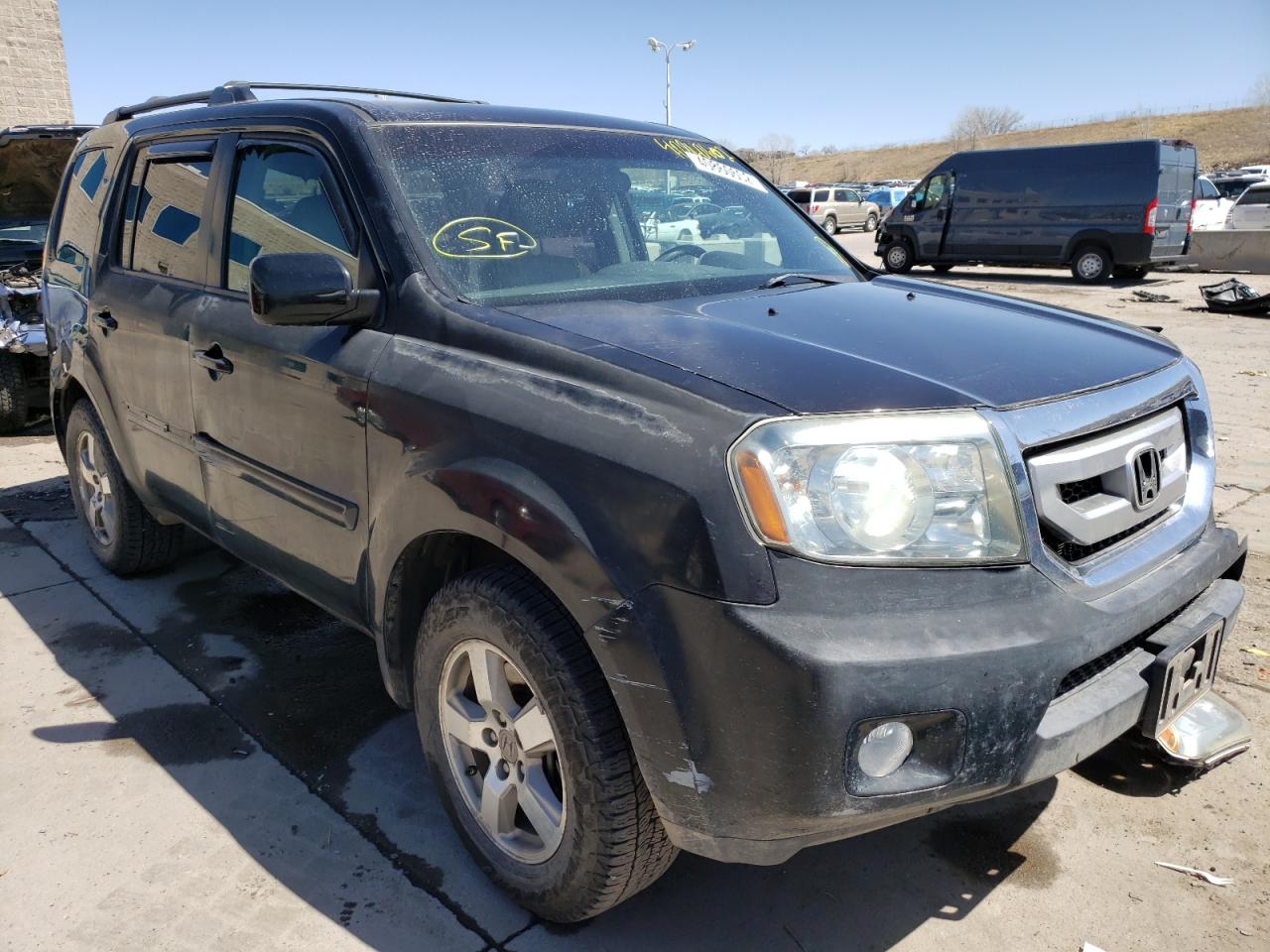 HONDA PILOT EX 2011 with VIN 5FNYF4H47BB015759 - Photo from auction