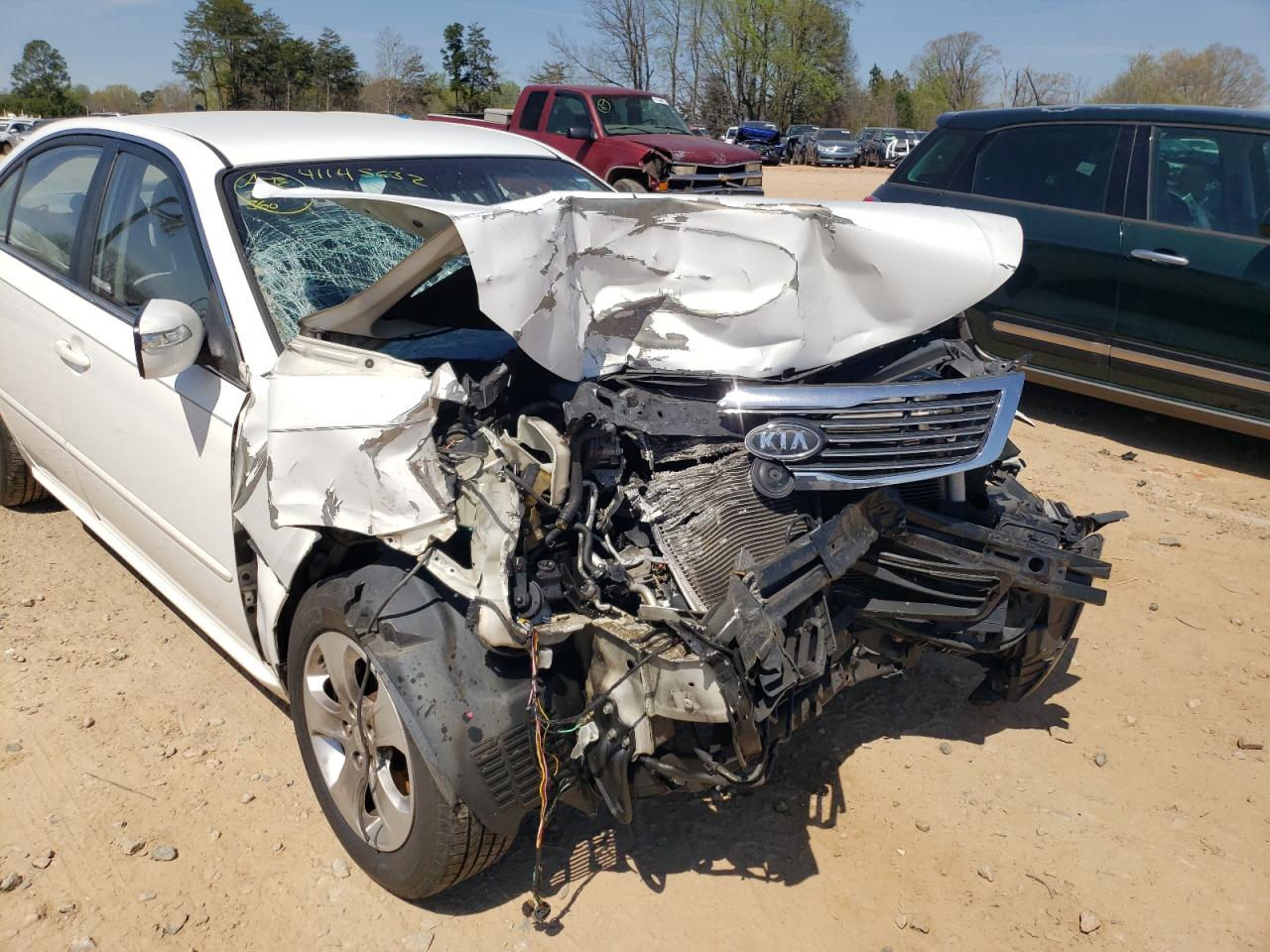 Photo 9 from auction – 2009 KIA OPTIMA LX with VIN KNAGE228095367671