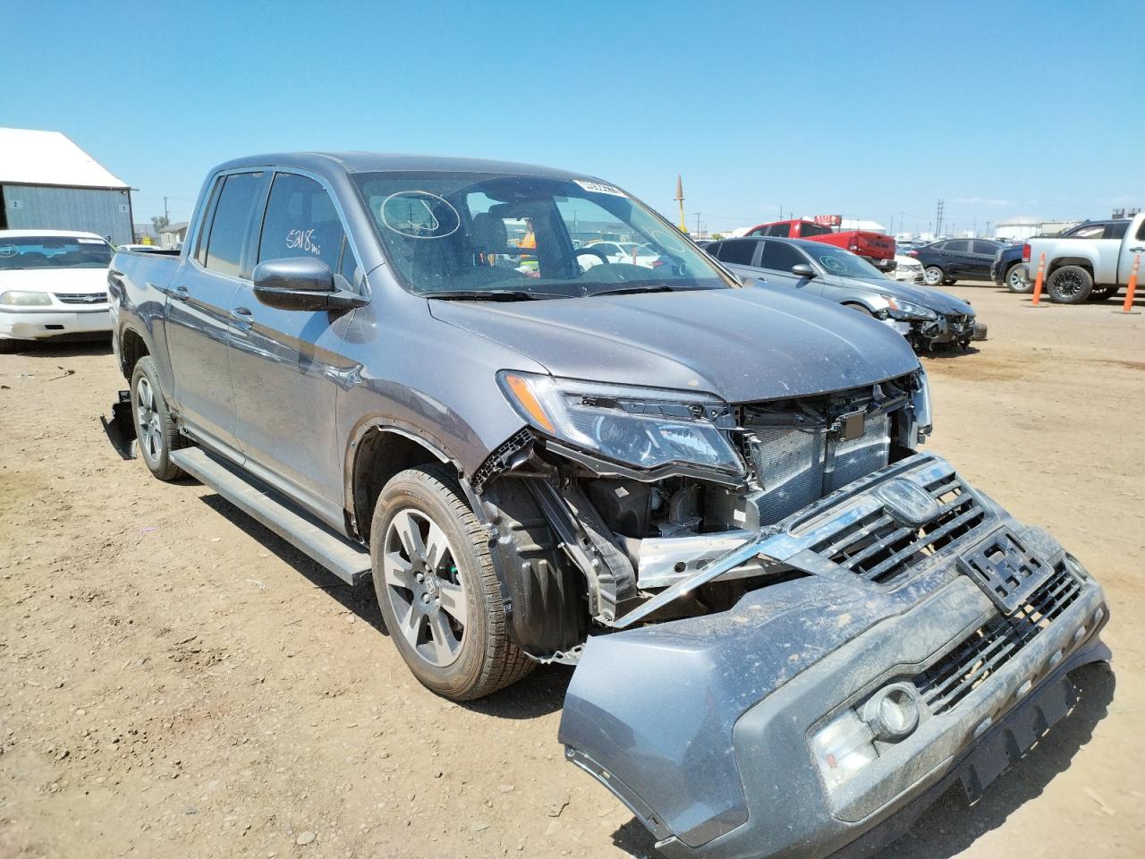 HONDA RIDGELINE 2020 with VIN 5FPYK3F54LB029953 - Photo from auction