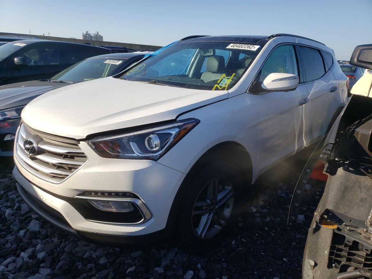 Photo 2 from auction – 2018 HYUNDAI SANTA FE S with VIN 5NMZU3LB4JH105474
