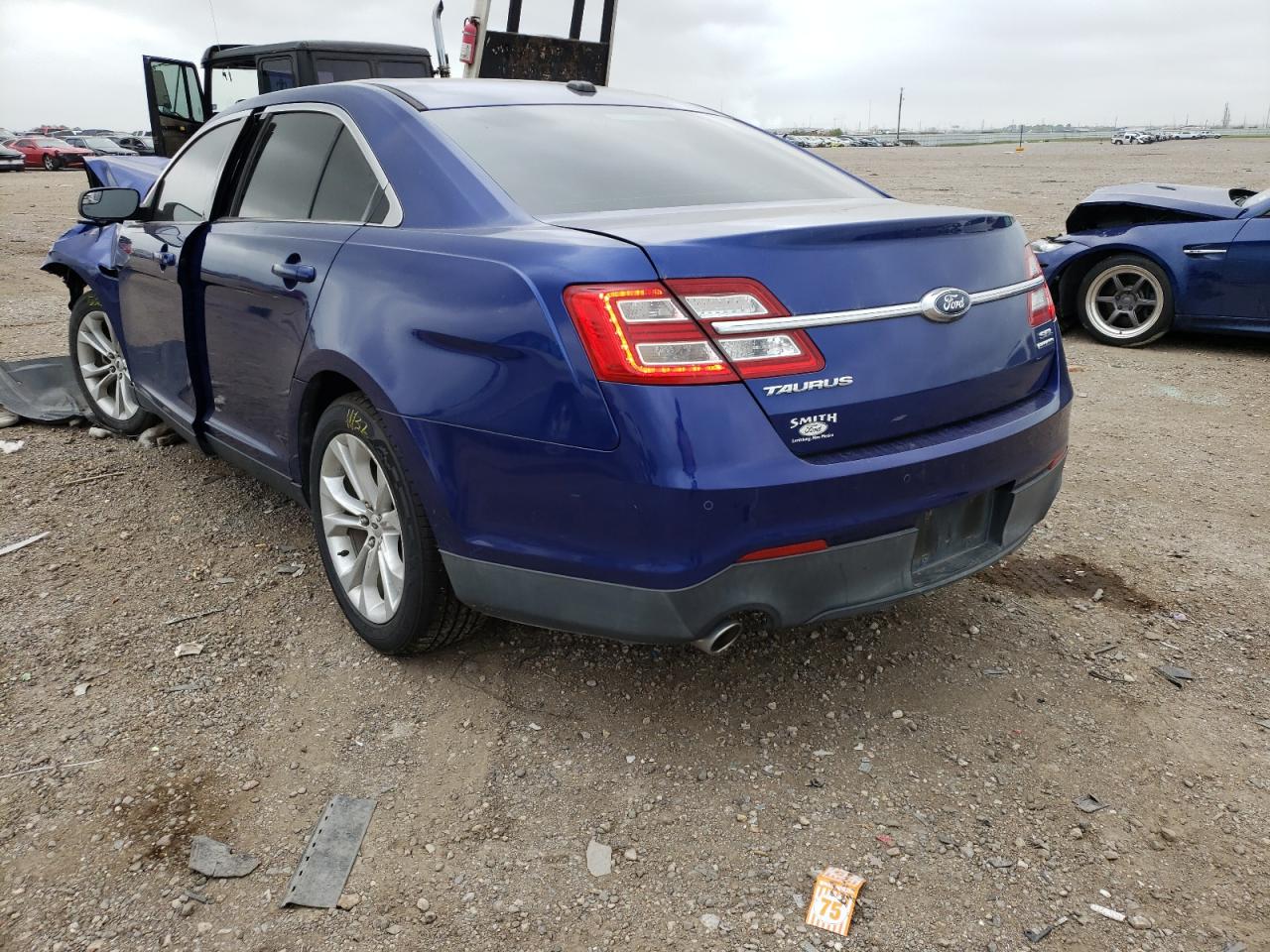 Photo 3 from auction – 2013 FORD TAURUS SEL with VIN 1FAHP2E8XDG221259