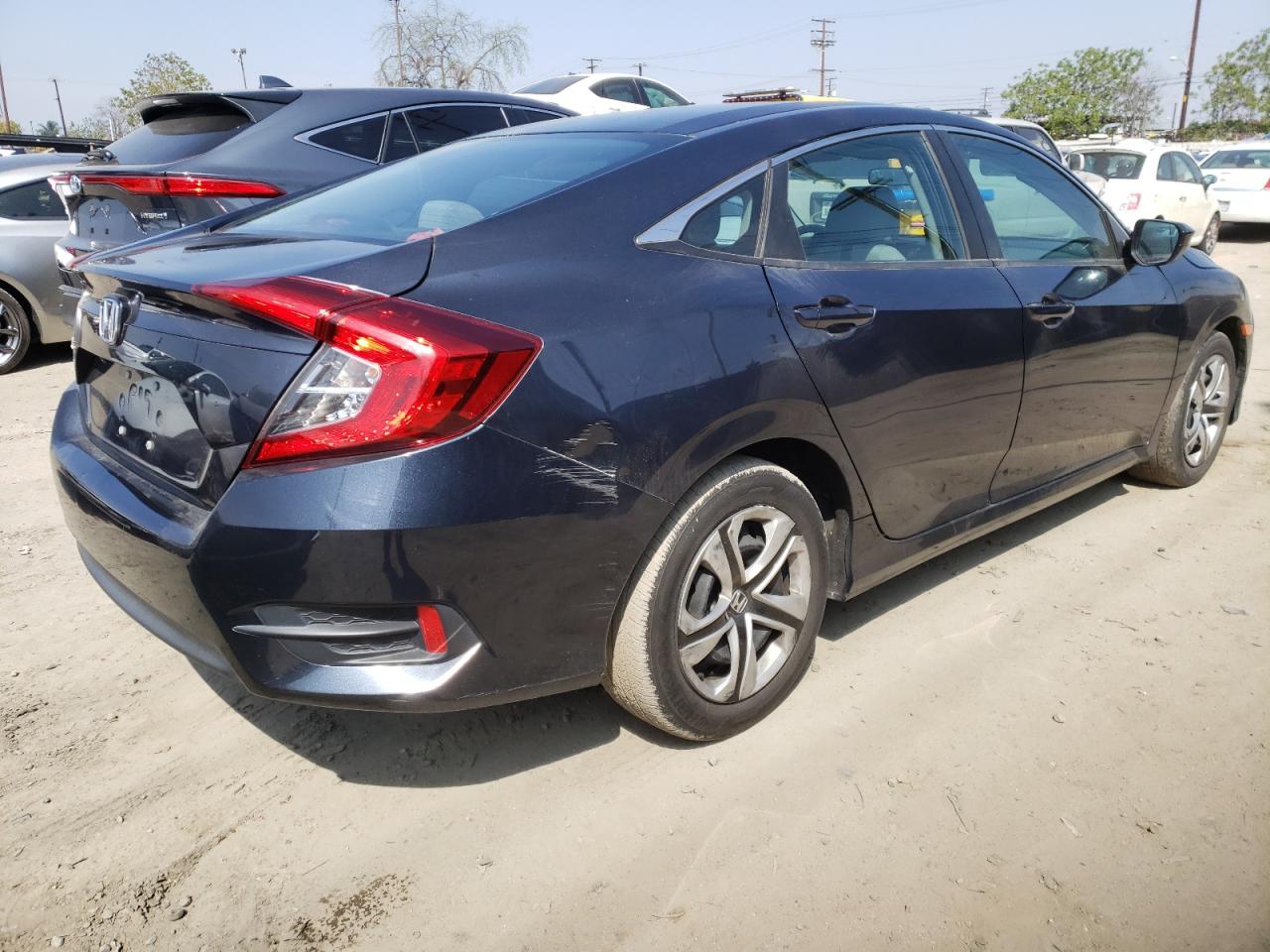 Photo 4 from auction – 2017 HONDA CIVIC LX with VIN 2HGFC2F58HH508130