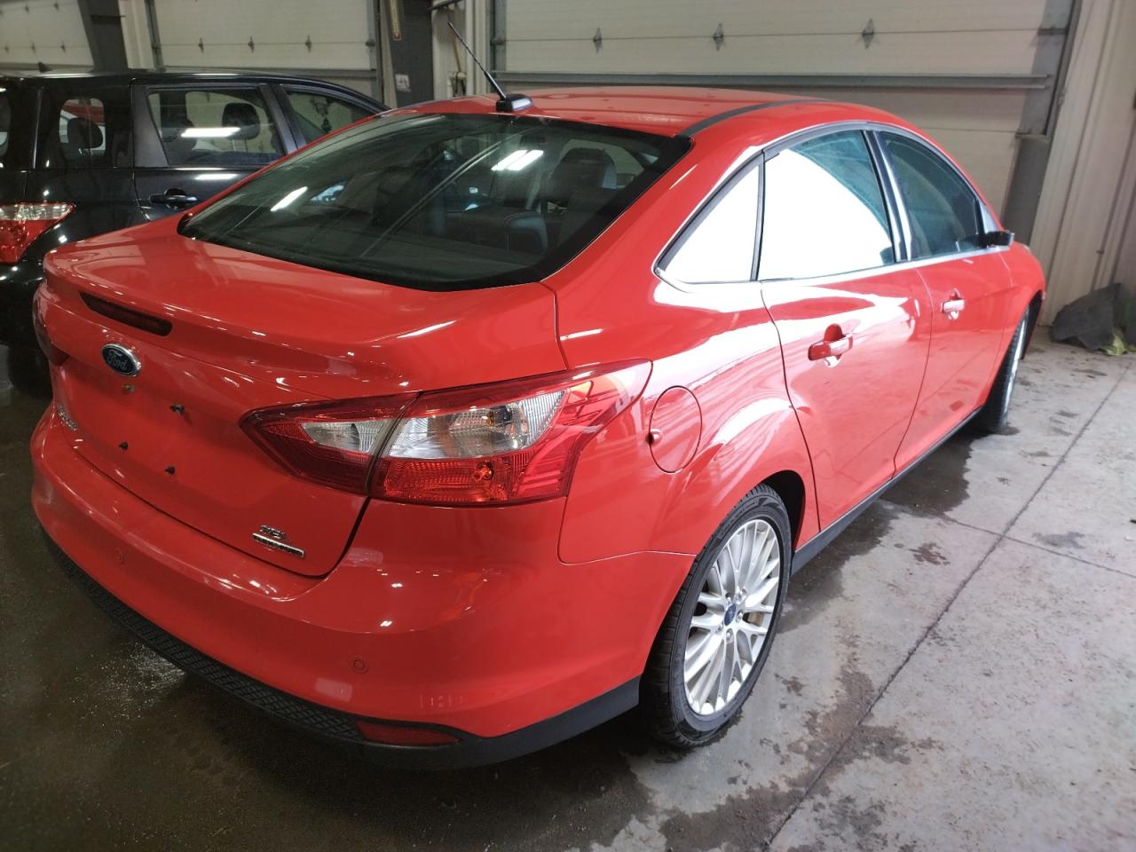 Photo 4 from auction – 2012 FORD FOCUS SEL with VIN 1FAHP3H28CL467617