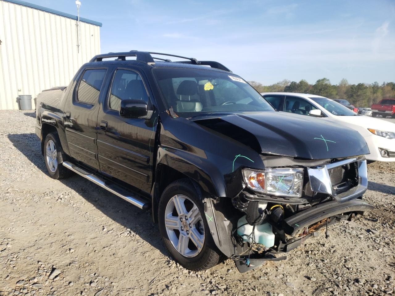 HONDA RIDGELINE 2014 with VIN 5FPYK1F51EB002314 - Photo from auction