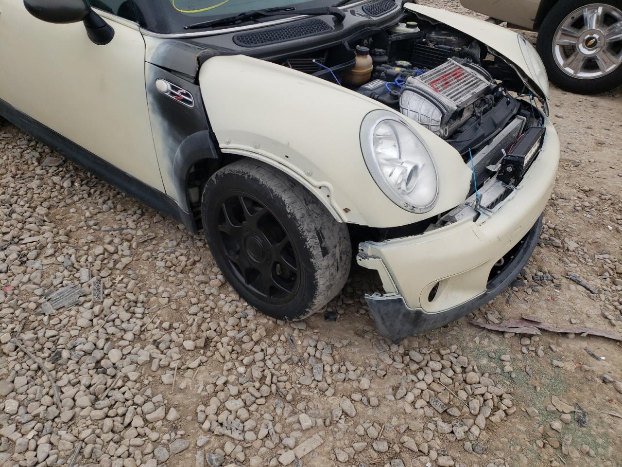 Photo 9 from auction – 2006 MINI COOPER S with VIN WMWRE335X6TG99517