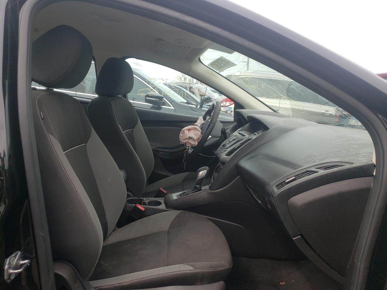 Photo 5 from auction – 2014 FORD FOCUS SE with VIN 1FADP3F22EL427845