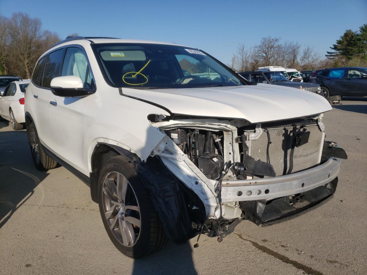 HONDA PILOT ELIT 2017 with VIN 5FNYF6H04HB098858 - Photo from auction