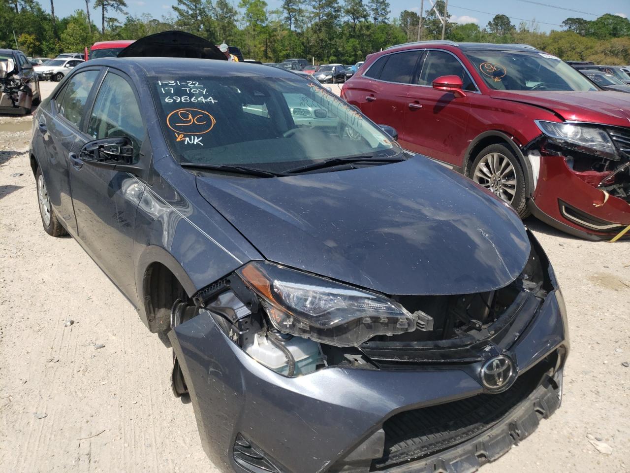 TOYOTA COROLLA L 2017 with VIN 5YFBURHE9HP698644 - Photo from auction