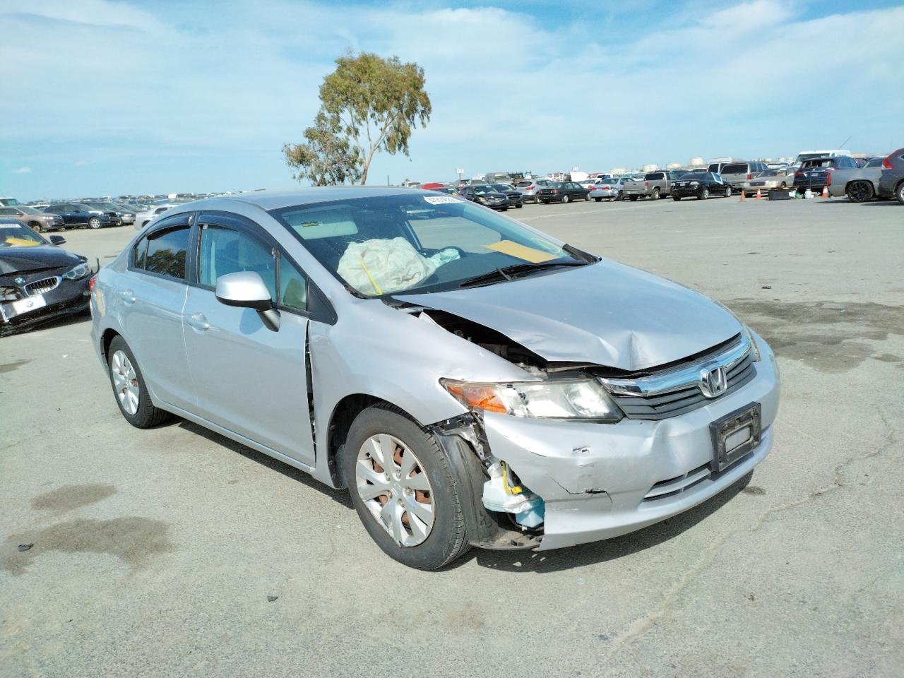 HONDA CIVIC LX 2012 with VIN 19XFB2F57CE335691 - Photo from auction