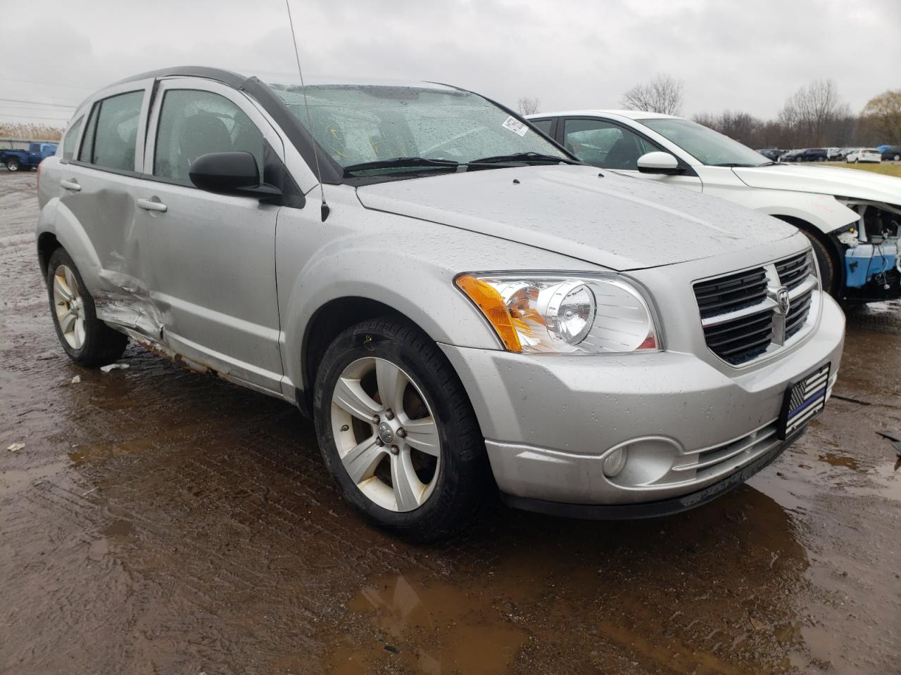 DODGE CALIBER MA 2011 with VIN 1B3CB3HA4BD268472 - Photo from auction