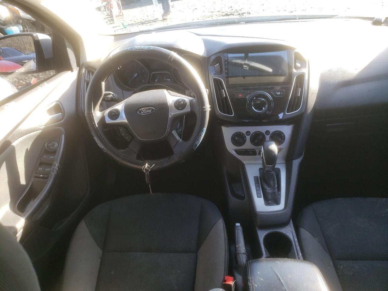 Photo 9 from auction – 2014 FORD FOCUS SE with VIN 1FADP3F29EL312658