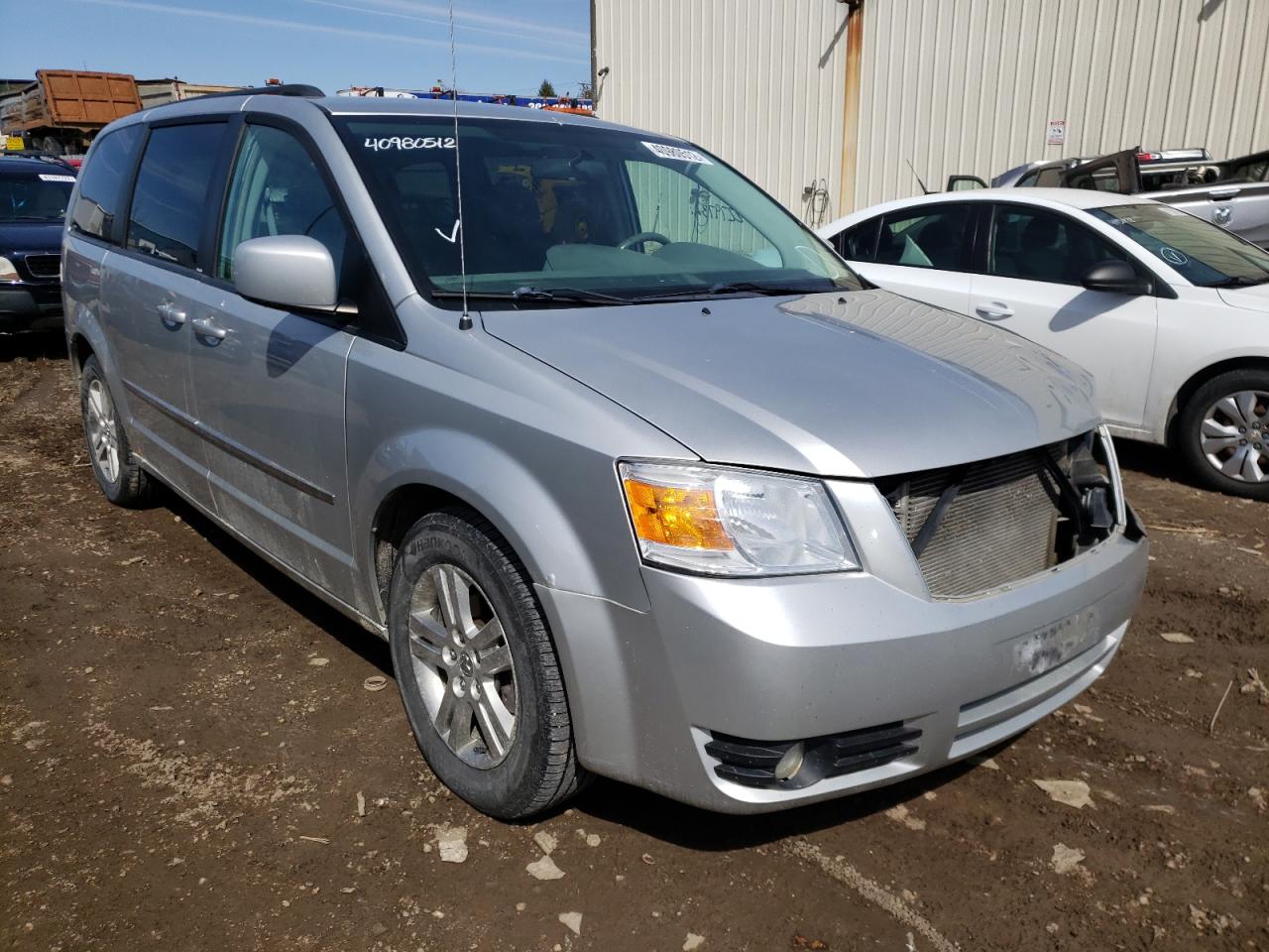 DODGE GRAND CARA 2010 with VIN 2D4RN6DX7AR390513 - Photo from auction
