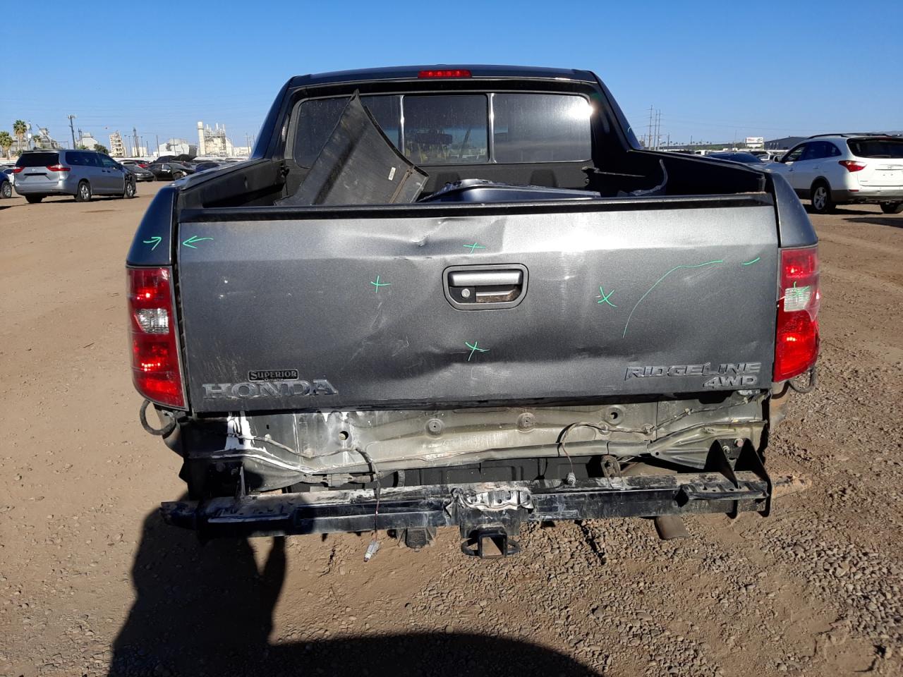 Photo 9 from auction – 2011 HONDA RIDGELINE with VIN 5FPYK1F5XBB010231