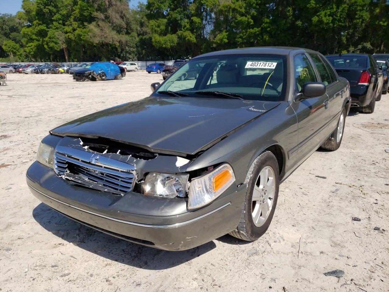 Photo 2 from auction – 2004 FORD CROWN VICT with VIN 2FAHP74W14X164442