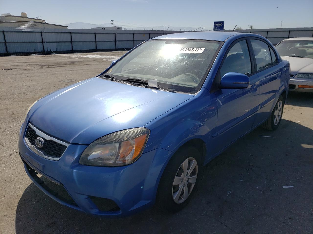 Photo 2 from auction – 2010 KIA RIO LX with VIN KNADH4A35A6711912