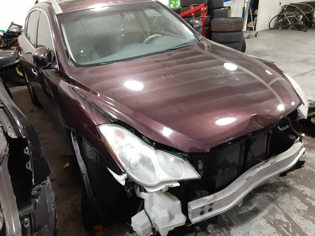 INFINITI EX35 BASE 2012 with VIN JN1AJ0HR2CM453296 - Photo from auction