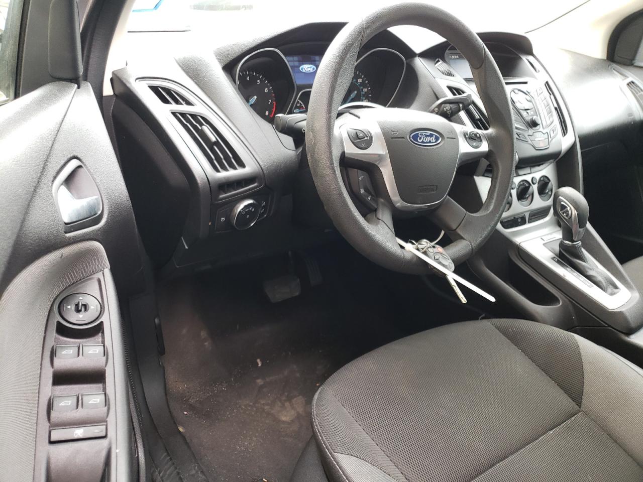 Photo 9 from auction – 2014 FORD FOCUS SE with VIN 1FADP3F21EL400894