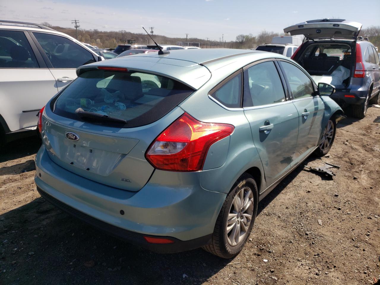Photo 4 from auction – 2012 FORD FOCUS SEL with VIN 1FAHP3M21CL348524