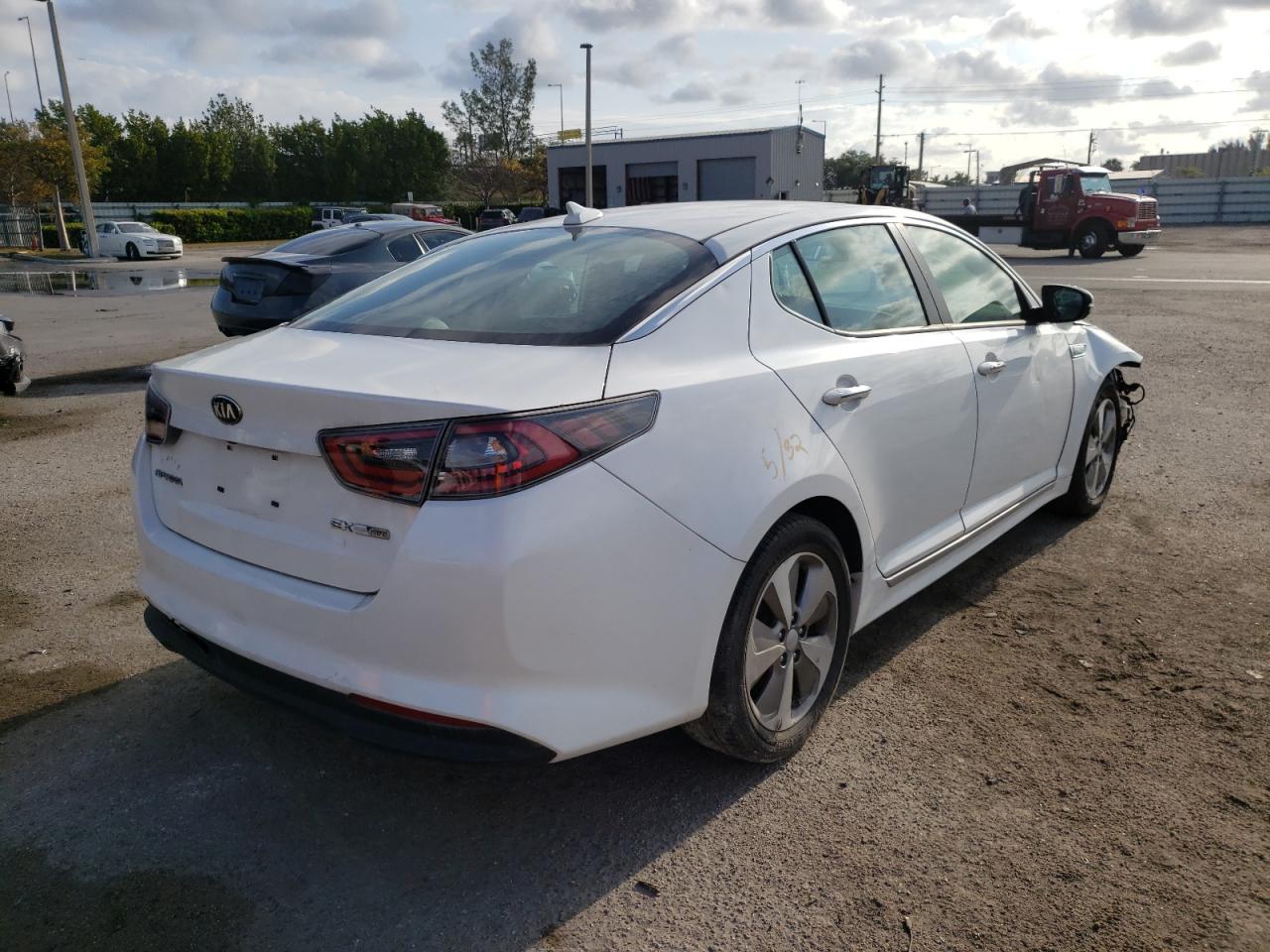 Photo 4 from auction – 2016 KIA OPTIMA HYB with VIN KNAGN4AD8G5098939