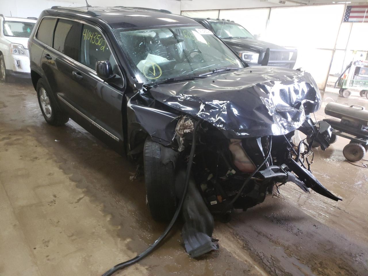 JEEP GRAND CHER 2011 with VIN 1J4RR4GG7BC527293 - Photo from auction