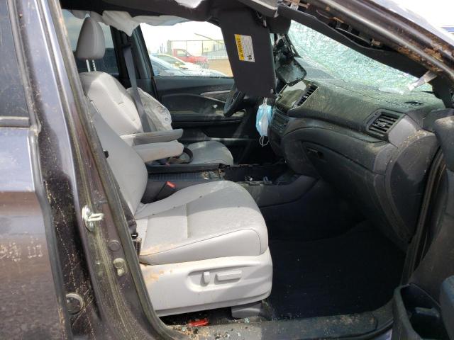 Photo 5 from auction – 2020 HONDA PASSPORT E with VIN 5FNYF7H57LB001498
