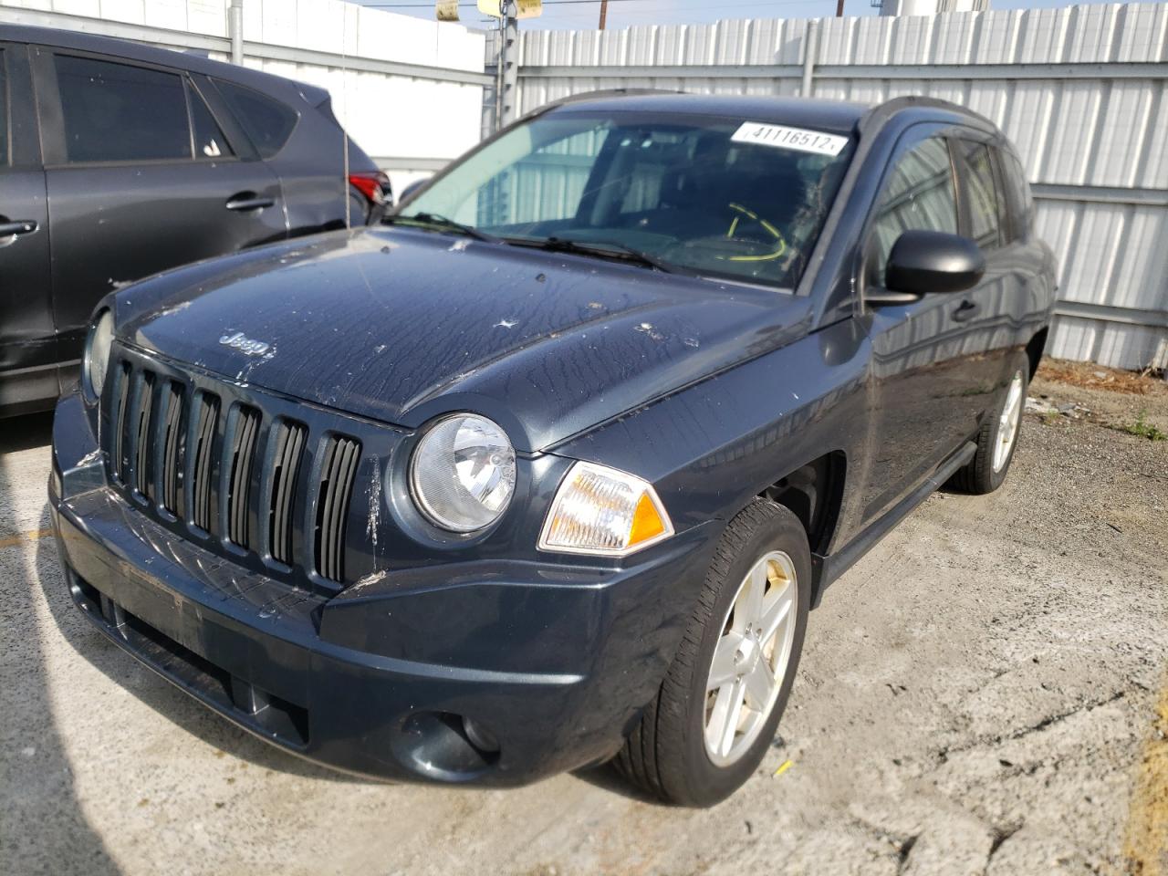 Photo 2 from auction – 2007 JEEP COMPASS with VIN 1J8FF47W77D170961