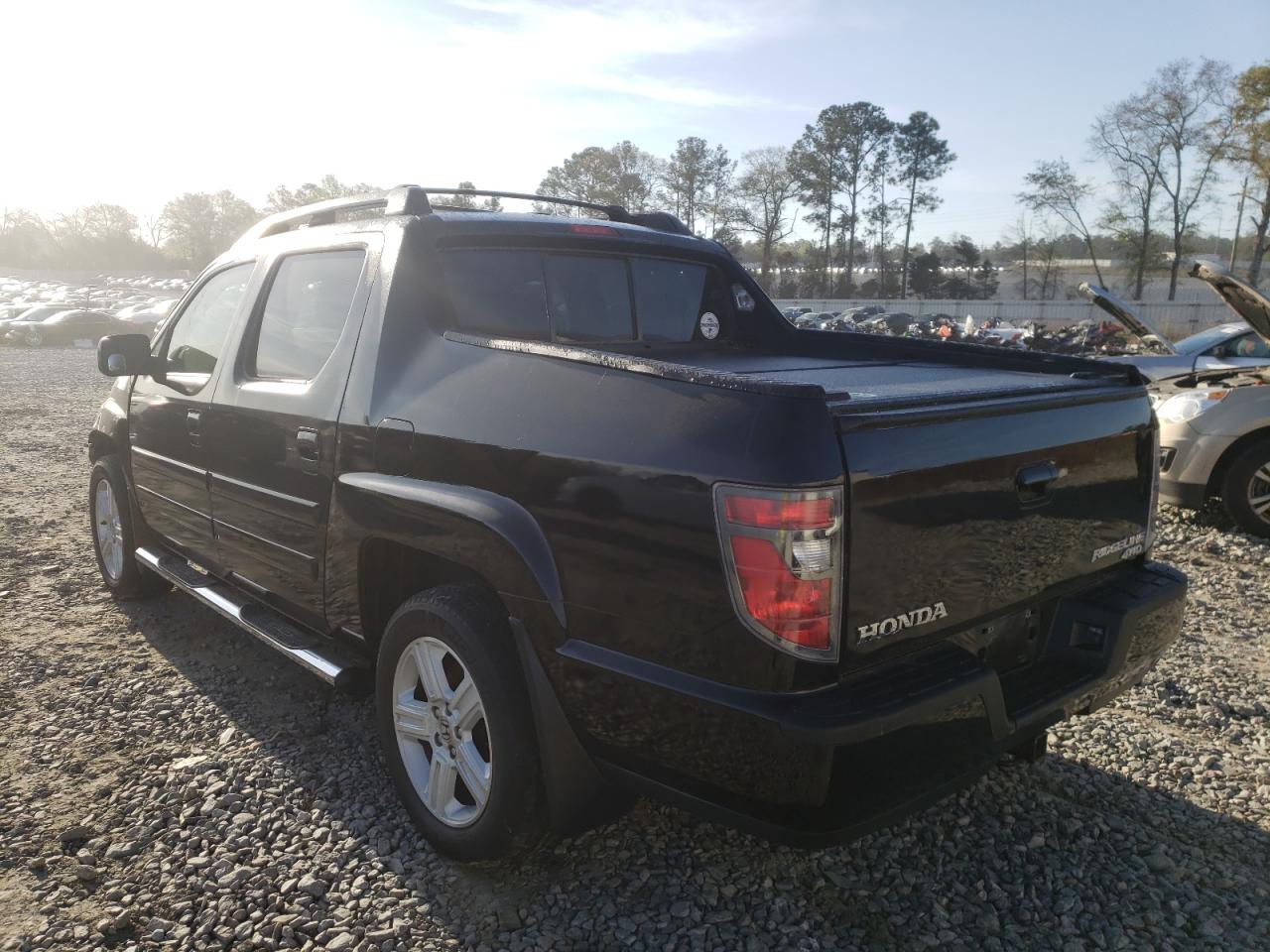 Photo 3 from auction – 2014 HONDA RIDGELINE with VIN 5FPYK1F51EB002314